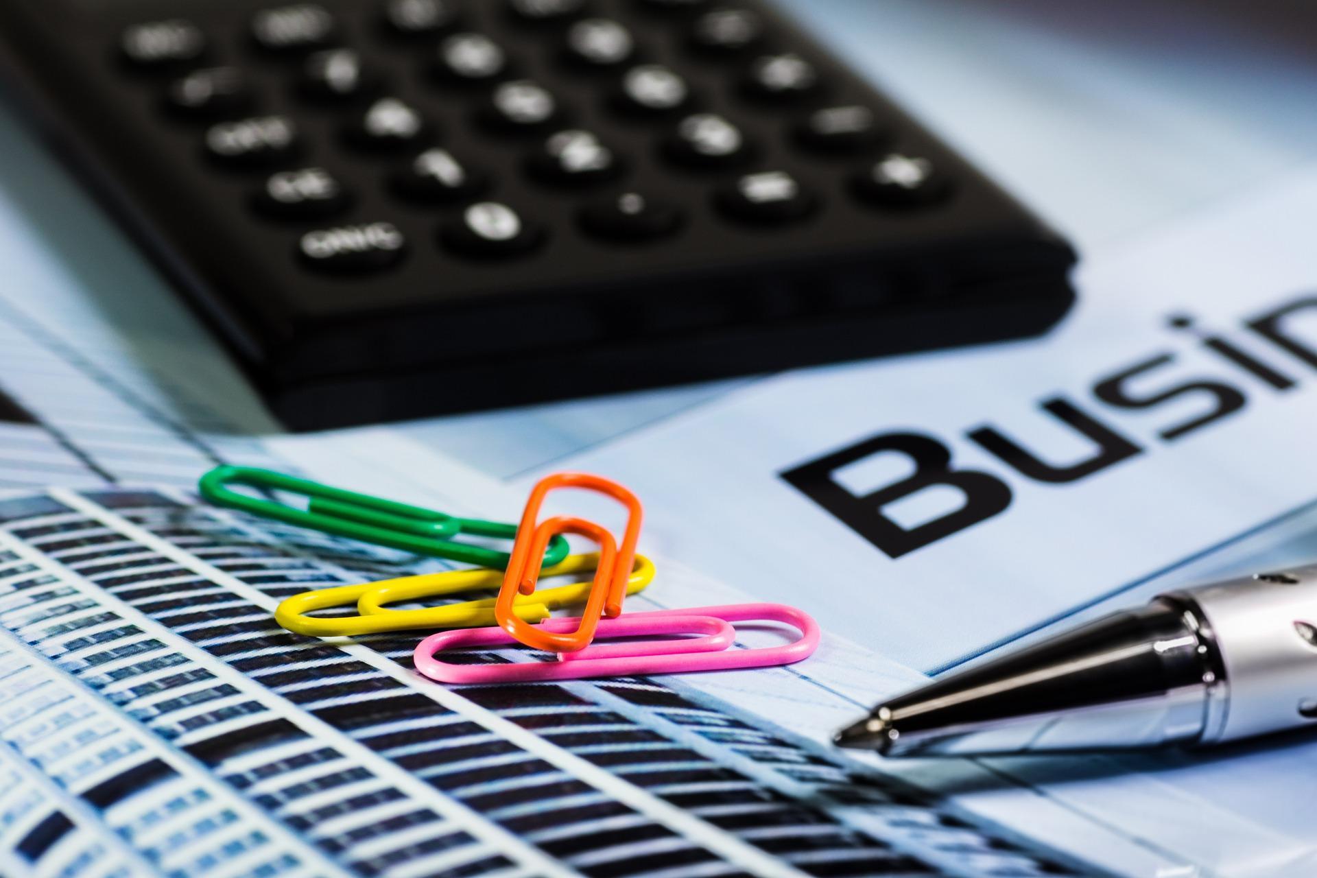 Calculator, paperclips, pen, businessplan
